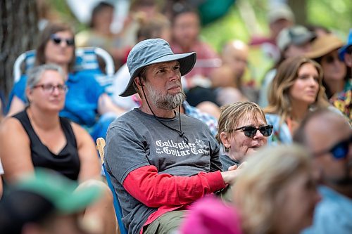 BROOK JONES / FREE PRESS
Folk Fest goers listen to Steph Strings, who is a musician based in Melbourne, Australia, perform on the Little Stage In The Forest at the 49th Winnipeg Folk Festival at Birds Hill Provincial Park in Man., Sunday, July 14, 2024.