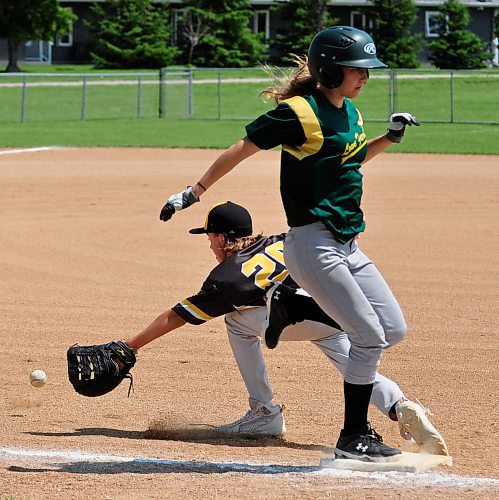 A Lowe Farm runner beats the throw to first base as Brandon Padres first baseman Ali Lang reaches out to scoop up the ball during second inning action in the gold medal game Sunday afternoon in Wawanesa. Lowe Farm erased an early 4-3 deficit to win the Baseball Manitoba 13U Tier 1 banner with a 14-6 victory. (Jules Xavier/The Brandon Sun)