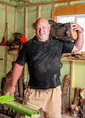 NIC ADAM / FREE PRESS
Sean Philips, 52, makes one-of-a-kind woodwork sculptures and pieces in the garage of his home from salvaged wood sourced here in MB.
240715 - Monday, July 15, 2024.

Reporter: