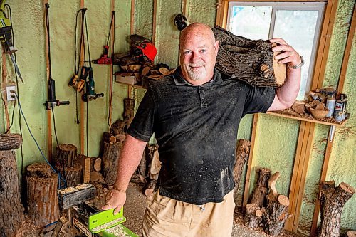 NIC ADAM / FREE PRESS
Sean Philips, 52, makes one-of-a-kind woodwork sculptures and pieces in the garage of his home from salvaged wood sourced here in MB.
240715 - Monday, July 15, 2024.

Reporter: