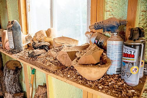 NIC ADAM / FREE PRESS
Sean Philips, 52, makes one-of-a-kind woodwork sculptures and pieces in the garage of his home from salvaged wood sourced here in MB.
A shelf in Philips&#x2019; studio full of partially finished projects.
240715 - Monday, July 15, 2024.

Reporter: