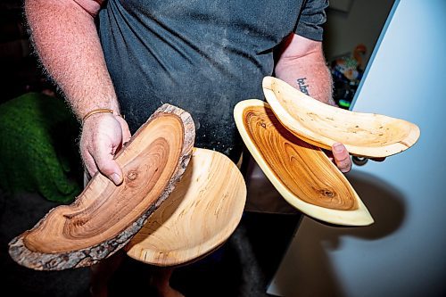 NIC ADAM / FREE PRESS
Sean Philips, 52, makes one-of-a-kind woodwork sculptures and pieces in the garage of his home from salvaged wood sourced here in MB.
Philips&#x2019; store-room in the basement of his home. This is where he stores pieces to sell at shows and events.
240715 - Monday, July 15, 2024.

Reporter: