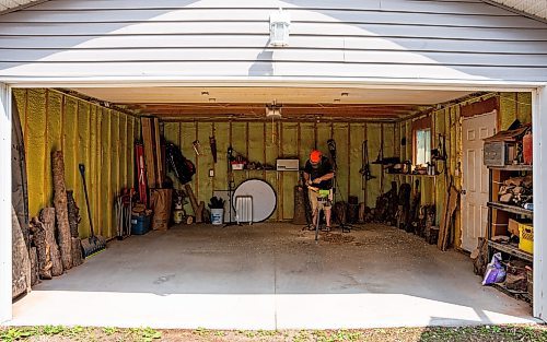 NIC ADAM / FREE PRESS
Sean Philips, 52, makes one-of-a-kind woodwork sculptures and pieces in the garage of his home from salvaged wood sourced here in MB.
240715 - Monday, July 15, 2024.

Reporter: