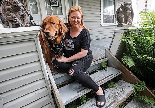 JOHN WOODS / FREE PRESS
Theresa Thomson, a performer and director,  and her dog Ragnar Lothpup. are photographed at her home in Winnipeg Tuesday, July 9, 2024. Thomson has billeted Fringe performers for the past 20 years, including Paco Erhard.

Reporter: ben