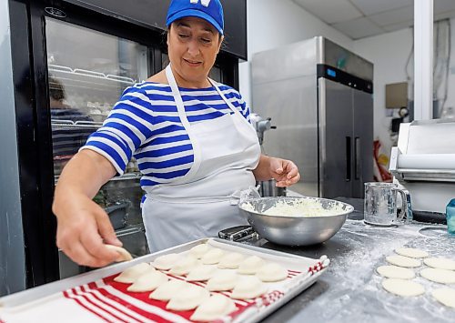 MIKE DEAL / FREE PRESS
Lorraine and David Pfeffer, the married couple behind West End Pierogies (833 Cavalier Dr.). They opened their retail spot in February of 2022 when cooking in a commercial kitchen one day a week wasn't enough to keep up with demand. 
See David Sanderson story
240716 - Tuesday, July 16, 2024.