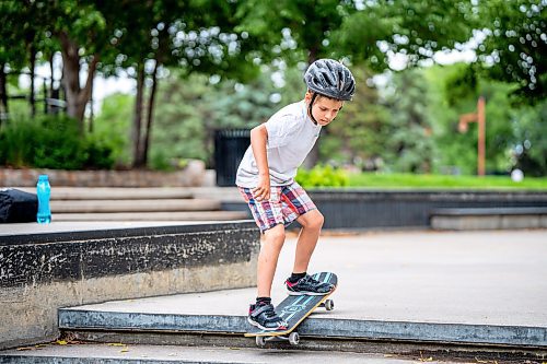 NIC ADAM / FREE PRESS
Hudson Cunnington learns to skate at Sk8 Skates&#x2019; free skateboarding class at the Forks on Tuesday afternoon.
240716 - Tuesday, July 16, 2024.

Reporter: Zoe