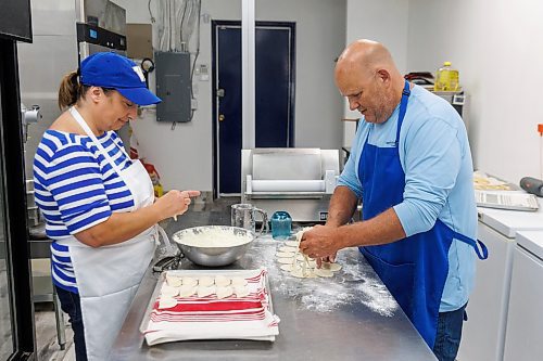 MIKE DEAL / FREE PRESS
Lorraine and David Pfeffer, the married couple behind West End Pierogies (833 Cavalier Dr.). They opened their retail spot in February of 2022 when cooking in a commercial kitchen one day a week wasn't enough to keep up with demand. 
See David Sanderson story
240716 - Tuesday, July 16, 2024.