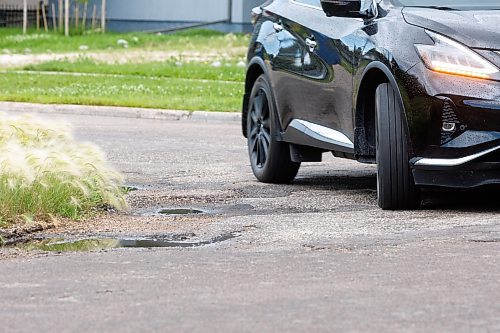 MIKE DEAL / FREE PRESS

The condition of the Eldridge Avenue at Haney Street, showing potholes, crumbling curbs, and cracks in the pavement.

See 49.8 street construction project

240716 - Tuesday, July 16, 2024.