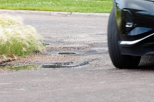 MIKE DEAL / FREE PRESS

The condition of the Eldridge Avenue at Haney Street, showing potholes, crumbling curbs, and cracks in the pavement.

See 49.8 street construction project

240716 - Tuesday, July 16, 2024.