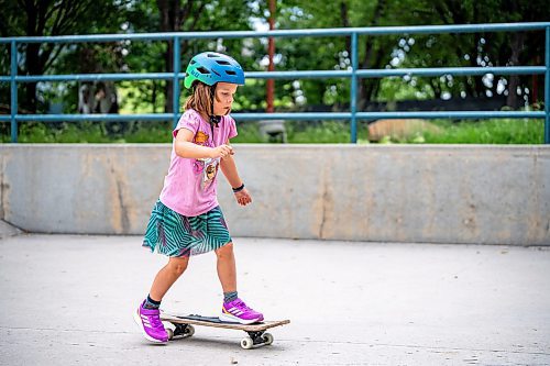 NIC ADAM / FREE PRESS
Jensen Cunnington learns to skate at Sk8 Skates&#x2019; free skateboarding class at the Forks on Tuesday afternoon.
240716 - Tuesday, July 16, 2024.

Reporter: Zoe