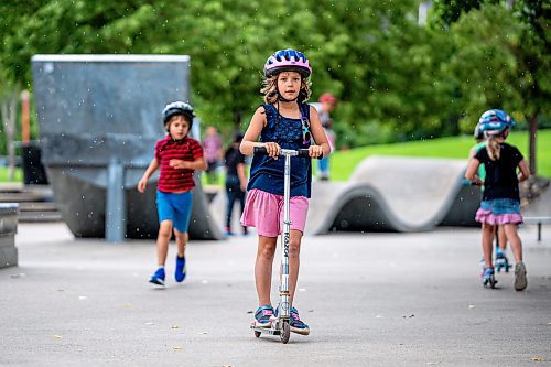 NIC ADAM / FREE PRESS
Aurelia Cunnington learns to skate at Sk8 Skates&#x2019; free skateboarding class at the Forks on Tuesday afternoon.
240716 - Tuesday, July 16, 2024.

Reporter: Zoe