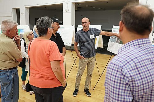 16072024
Donovan Toews, Managing Partner with Landmark Planning &amp; Design, speaks with westman residents during a public open house and consultation regarding Highway 1 and Highway 5 Intersection Improvements at the Carberry Community Memorial Hall on Tuesday evening. 
(Tim Smith/The Brandon Sun)