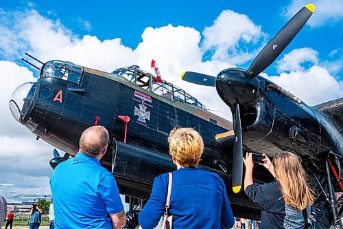 NIC ADAM / FREE PRESS
(From left) David, Debra, and Emily Reimer  look at the Lancaster at the Royal Aviation Museum of Western Canada on Tuesday afternoon.
240716 - Tuesday, July 16, 2024.

Reporter: Nicole