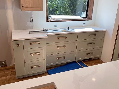 Marc LaBossiere / Winnipeg Free Press

Two identical and opposite countertops wings are position atop the cabinets on either side of the centred stove location.

 