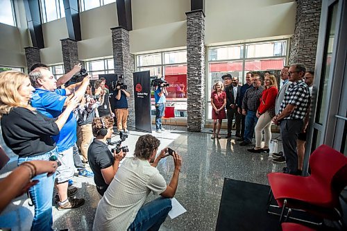 MIKAELA MACKENZIE / FREE PRESS

Involved parties pose for a photo at an announcement about $100,000 raised at Whiteout Parties going to community organizations on Wednesday, July 17, 2024.

For sports story.

