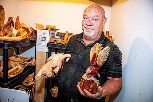 NIC ADAM / FREE PRESS
Sean Philips, 52, makes one-of-a-kind woodwork sculptures and pieces in the garage of his home from salvaged wood sourced here in MB.
Philips&#x2019; store-room in the basement of his home. This is where he stores pieces to sell at shows and events.
240715 - Monday, July 15, 2024.

Reporter: