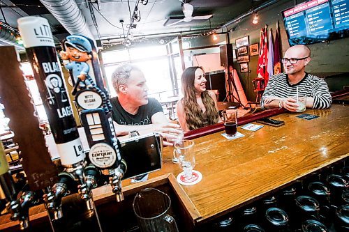 JOHN WOODS / FREE PRESS
Shane McKenzie, chairman of the board, from left, Brittany Roginson, and Aaron Nolin have a drink at the ANAF in Osbourne Village Tuesday, July 16, 2024. 

Reporter: