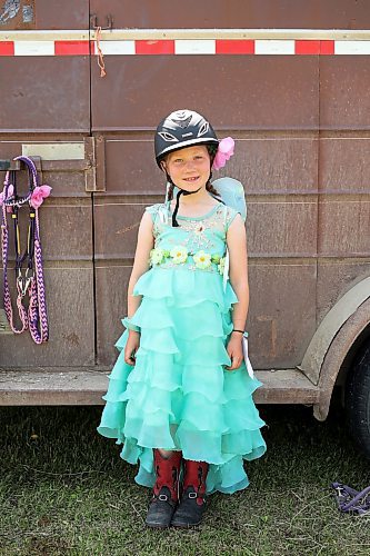 Amelia Coey of Minnedosa after competing in the miniature horse judging seven-and-under costume class with her horse Jellybean. (Tim Smith/The Brandon Sun)