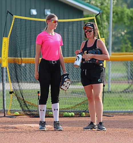 Under-15 Brandon Heat first and third baseman Elli Pomehichuk, shown with head coach Jill Martine at a recent practice, said the team has become very close. (Perry Bergson/The Brandon Sun)
July 25, 2024