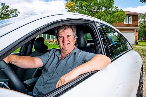 NIC ADAM / FREE PRESS
Kent Heinrich pictured alongside his 2024 Hyundai Ioniq 6 on Wednesday afternoon.
240717 - Wednesday, July 17, 2024.

Reporter: ?