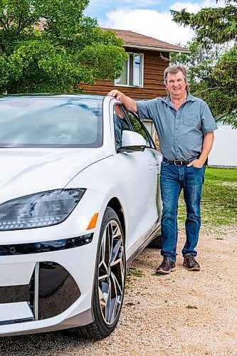 NIC ADAM / FREE PRESS
Kent Heinrich pictured alongside his 2024 Hyundai Ioniq 6 on Wednesday afternoon.
240717 - Wednesday, July 17, 2024.

Reporter: ?