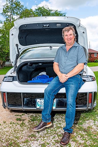 NIC ADAM / FREE PRESS
Kent Heinrich pictured alongside his 2024 Hyundai Ioniq 6 on Wednesday afternoon.
240717 - Wednesday, July 17, 2024.

Reporter: ?