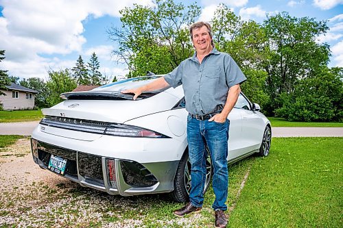 NIC ADAM / FREE PRESS
Kent Heinrich pictured alongside his 2024 Hyundai Ioniq 6 on Wednesday afternoon.
240717 - Wednesday, July 17, 2024.

Reporter: ?