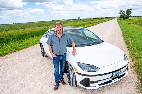 NIC ADAM / FREE PRESS
Kent Heinrich pictured alongside his 2024 Hyundai Ioniq 6 on Wednesday afternoon.
240717 - Wednesday, July 17, 2024.

Reporter: ?