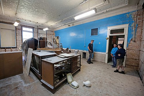 Rapid City Museum and Cultural Centre board members Duncan Martin, from left, Margo Eckbert and Shirley Martin stand in a former classroom in what was once the community's school building. Shirley has memories of having spent half of her Kindergarten schooling in this classroom before its use as a school was discontinued in the late 60s. (Matt Goerzen/The Brandon Sun)