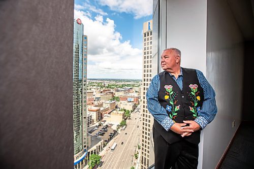 MIKAELA MACKENZIE / FREE PRESS

David Chartrand, president of the Manitoba Mtis Federation, checks out the view from 333 Main St. on Wednesday, July 17, 2024. The MMF bought the two Bell MTS branded towers (and a parking lot) in downtown Winnipeg near Portage &amp; Main. 

For Gabby story.

