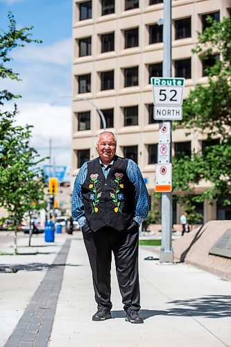 MIKAELA MACKENZIE / FREE PRESS

David Chartrand, president of the Manitoba Mtis Federation, in front their new property acquisitions on Wednesday, July 17, 2024. The MMF bought the two Bell MTS branded towers (and a parking lot) in downtown Winnipeg near Portage &amp; Main. 

For Gabby story.

