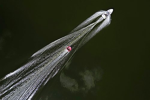 17072024
A boat pulls a group of people on a tube across Shoal Lake on a sunny and hot Wednesday afternoon. 
(Tim Smith/The Brandon Sun)default