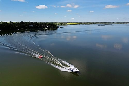 17072024
A boat pulls a group of people on a tube across Shoal Lake on a sunny and hot Wednesday afternoon. 
(Tim Smith/The Brandon Sun)