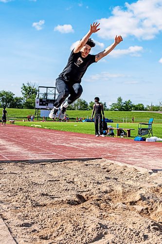 NIC ADAM / FREE PRESS
Daxx Turner pictured practicing triple jump at the University of Manitoba track stadium Wednesday afternoon.
240717 - Wednesday, July 17, 2024.

Reporter:
