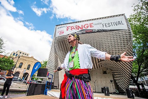 MIKAELA MACKENZIE / FREE PRESS

Captain Braggadocio, a.k.a. Tim Webster, announces the next performer at the Old Market Square outdoor stage as Fringe festival launches in Winnipeg on Wednesday, July 17, 2024.

