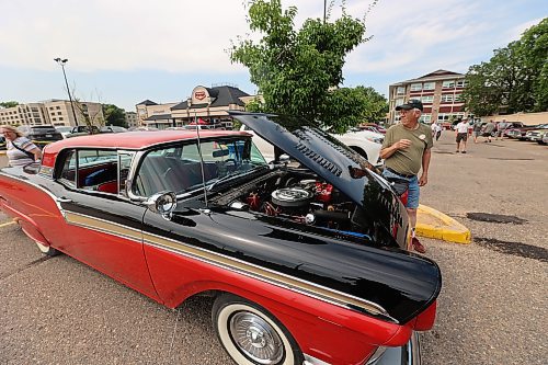 Lothar Weber stands with his 1957 Ford Skyline at the charity car show and barbecue at the Richmond Avenue Co-op on Thursday. (Photos by Abiola Odutola/The Brandon Sun)