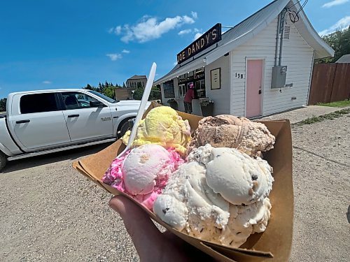 A Joe Dandy's Drive-In specialty,&#x2b4;he Ice Cream Flight &#x44a;four scoops of hard ice cream served in a cardboard dish. In this case, the four flavours included Cherry Cheesecake, mocha almond fudge, chocolate chip cookie dough and lavendar lemonade. Careful with this one &#x44a;it's heavy! (Matt Goerzen/The Brandon Sun)