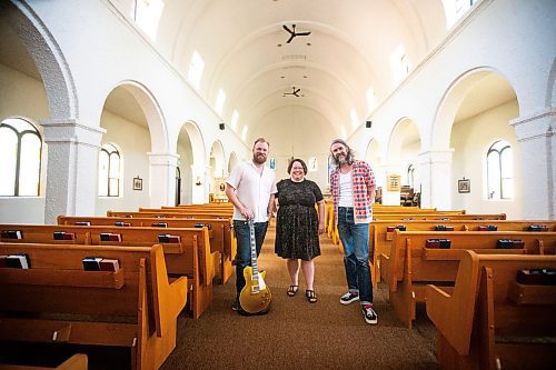 MIKAELA MACKENZIE / FREE PRESS

Joey Landreth (left), reverend Lauren Schoeck, and Dave Landreth in the sanctuary of St. Michael and All Angels&#x560;Anglican Church on Thursday, July 18, 2024. Bros Landreth music fan Mark Chipman purchased the church to give the group studio space and a home for their record label music management company (the church congregation will also continue to worship there). 

For Tyler story.