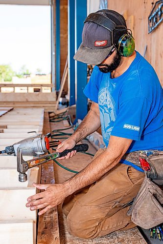 NIC ADAM / FREE PRESS
Shop lead Leo Carvaltto, pictured prefabing a condo floor, has been with Holz for 14 years. 
240718 - Thursday, July 18, 2024.

Reporter: Aaron