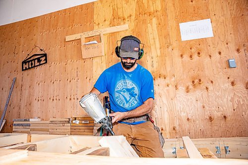 NIC ADAM / FREE PRESS
Shop lead Leo Carvaltto, pictured prefabing a condo floor, has been with Holz for 14 years. 
240718 - Thursday, July 18, 2024.

Reporter: Aaron