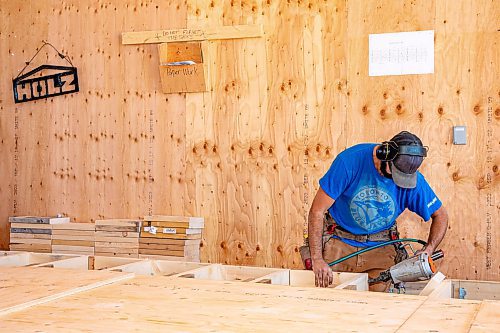 NIC ADAM / FREE PRESS
Shop lead Leo Carvaltto, pictured prefabing a condo floor, has been with Holz for 14 years. 
240718 - Thursday, July 18, 2024.

Reporter: Aaron