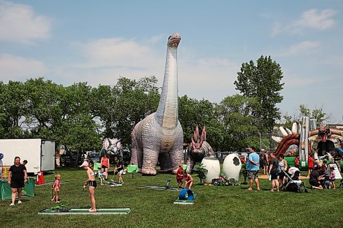 18072024
Kids play mini golf during the Hamiota Agricultural Society Fair on a hot Thursday afternoon. The fair included a mini golf tournament, a Mario Kart tournament, beach volleyball and baseball, a movie night, livestock shows and a variety of other entertainment and activities.
(Tim Smith/The Brandon Sun)