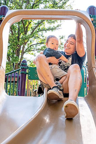 NIC ADAM / FREE PRESS
Cliff Tesoro, and his two-year-old son Castiel, have fun at St. Vital Park&#x2019;s playground Thursday afternoon.
240718 - Thursday, July 18, 2024.

Reporter: ?