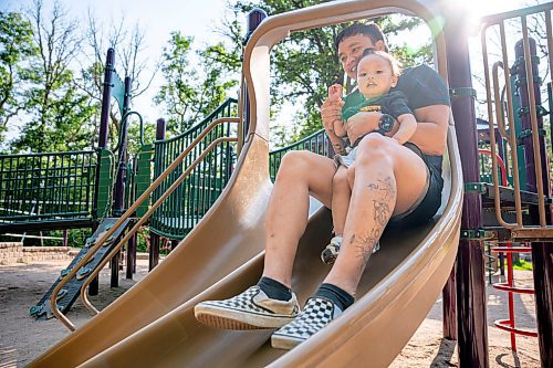 NIC ADAM / FREE PRESS
Cliff Tesoro, and his two-year-old son Castiel, have fun at St. Vital Park&#x2019;s playground Thursday afternoon.
240718 - Thursday, July 18, 2024.

Reporter: ?