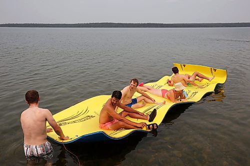 19072024
Swimmers enjoy the hot weather on a floating raft at Clear Lake on Friday.
(Tim Smith/The Brandon Sun)
