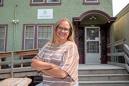 BROOK JONES / FREE PRESS
Katie Inverarity, who is the past chairperson of Heartwood Healing Centre, is pictured in front of the centre at 104 Roslyn Ave., in Winnipeg, Man., Friday, July 19, 2024. The local centre is a non-profit that supports Manitobans who have experienced childhood sexual abuse.