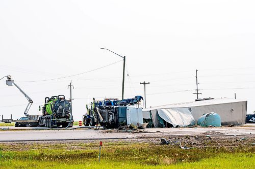 NIC ADAM / FREE PRESS
The aftermath of a collision between a car and tractor trailer at the intersection of hwy 75 and hwy 210 Friday afternoon. The Semi truck driver walked away with bruises while the other driver was rushed to hospital.
240719 - Friday, July 19, 2024.

Reporter: ?