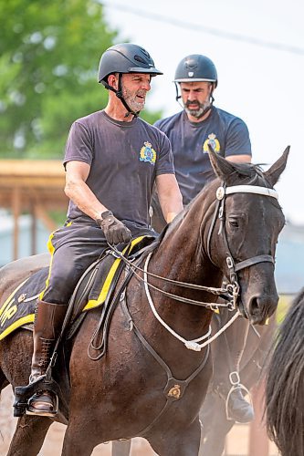 NIC ADAM / FREE PRESS
Members of the RCMP musical ride practice before their show at the Manitoba Stampede &amp; Exhibition Friday afternoon.
240719 - Friday, July 19, 2024.

Reporter: Jura