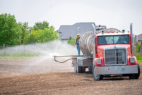 NIC ADAM / FREE PRESS
A truck waters down the main track at the Manitoba Stampede &amp; Exhibition Friday afternoon.
240719 - Friday, July 19, 2024.

Reporter: Jura