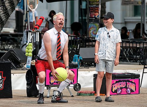 JOHN WOODS / FREE PRESS
Wham Glam Circus Man performs with Finn at the Fringe in Old Market Square Sunday, July 21, 2024. 

Reporter: